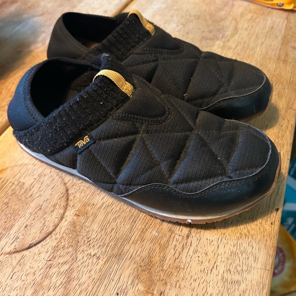 Teva Black Quilted Slip-Ons with Gold Detail